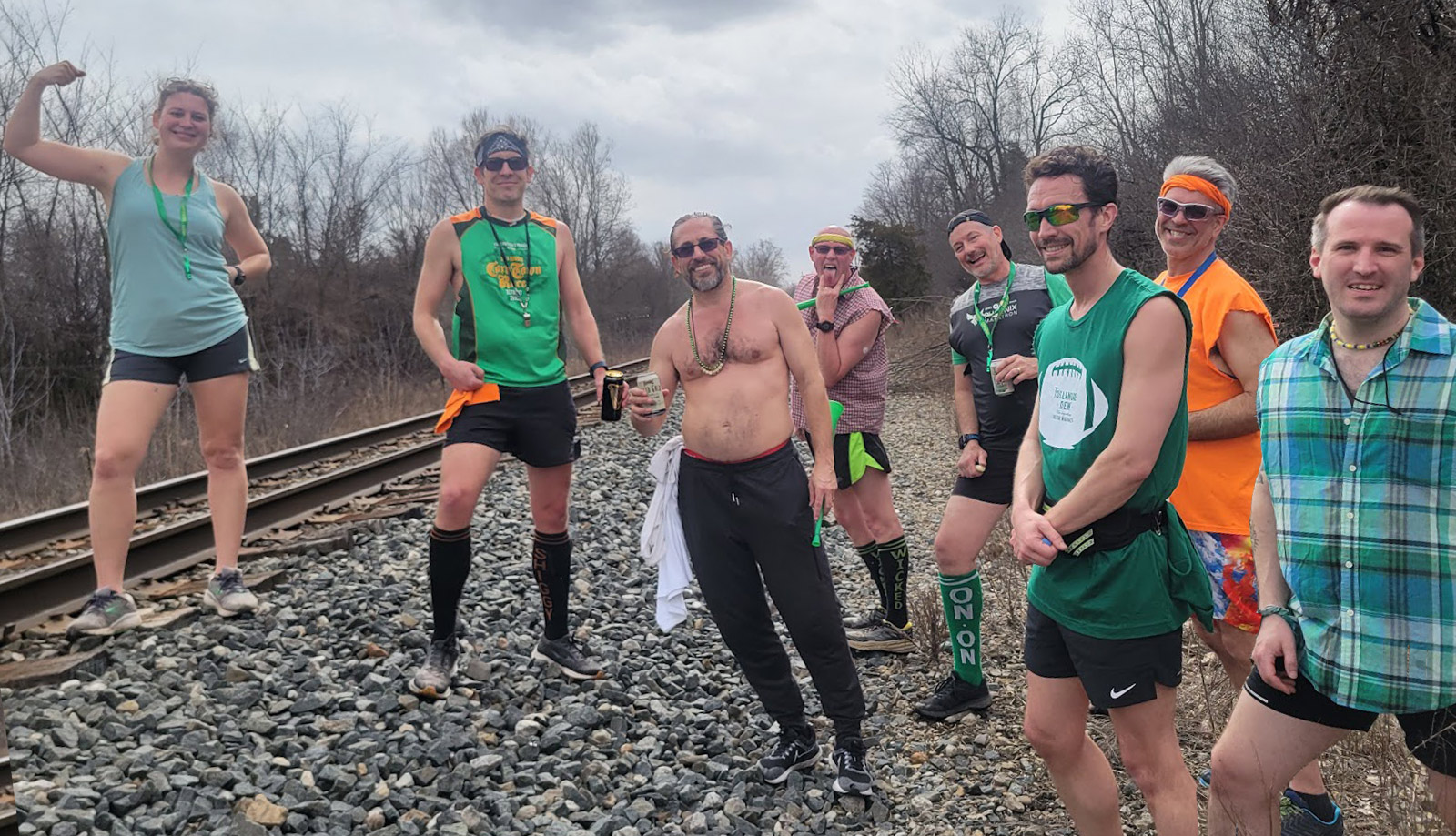 Photo of members of a Detroit area social running club paused to have a drink